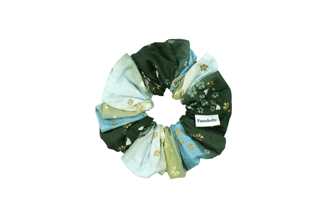 Multicolored scrunchie with floral pattern on a black background cotton