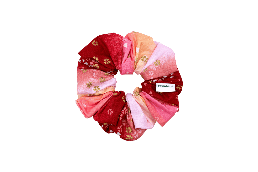 Multicolored scrunchie with floral patterns on a black background cotton