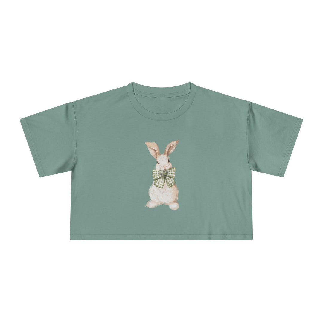 Women's sage green crop top with a watercolour bunny illustration wearing a gingham bow tie, Norwynd nature-inspired apparel