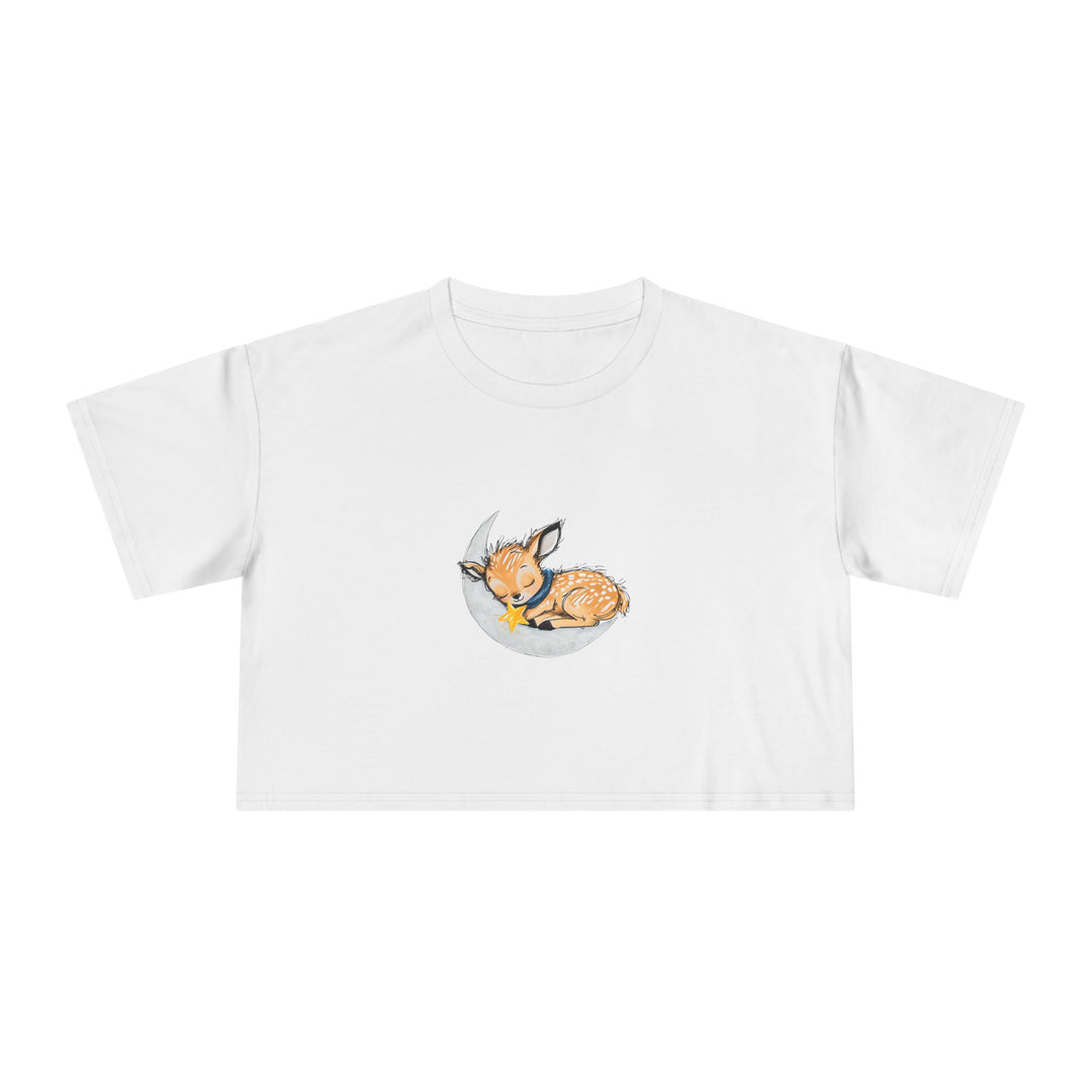 Women's white crop top with an illustration of a sleeping fawn curled up on a crescent moon holding a star, Norwynd woodland apparel